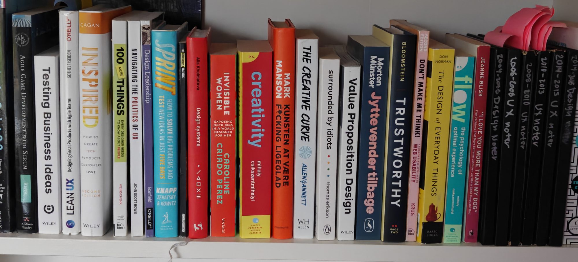 Philip's UX, product and design bookshelf, with hand-labelled UX notebooks from 2004 to 2016.